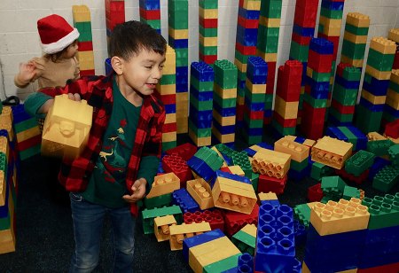 Annual Breakfast with Santa another big hit from Lemoore Lions Club JoJo Warren tasks himself with building a fort Saturday morning.